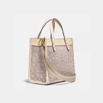 COACH 經典標誌緹花 FIELD TOTE 22號托特包 手提單肩斜挎包 象牙白/星夜藍