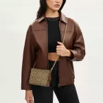 COACH 經典防刮皮革鏈條斜挎包